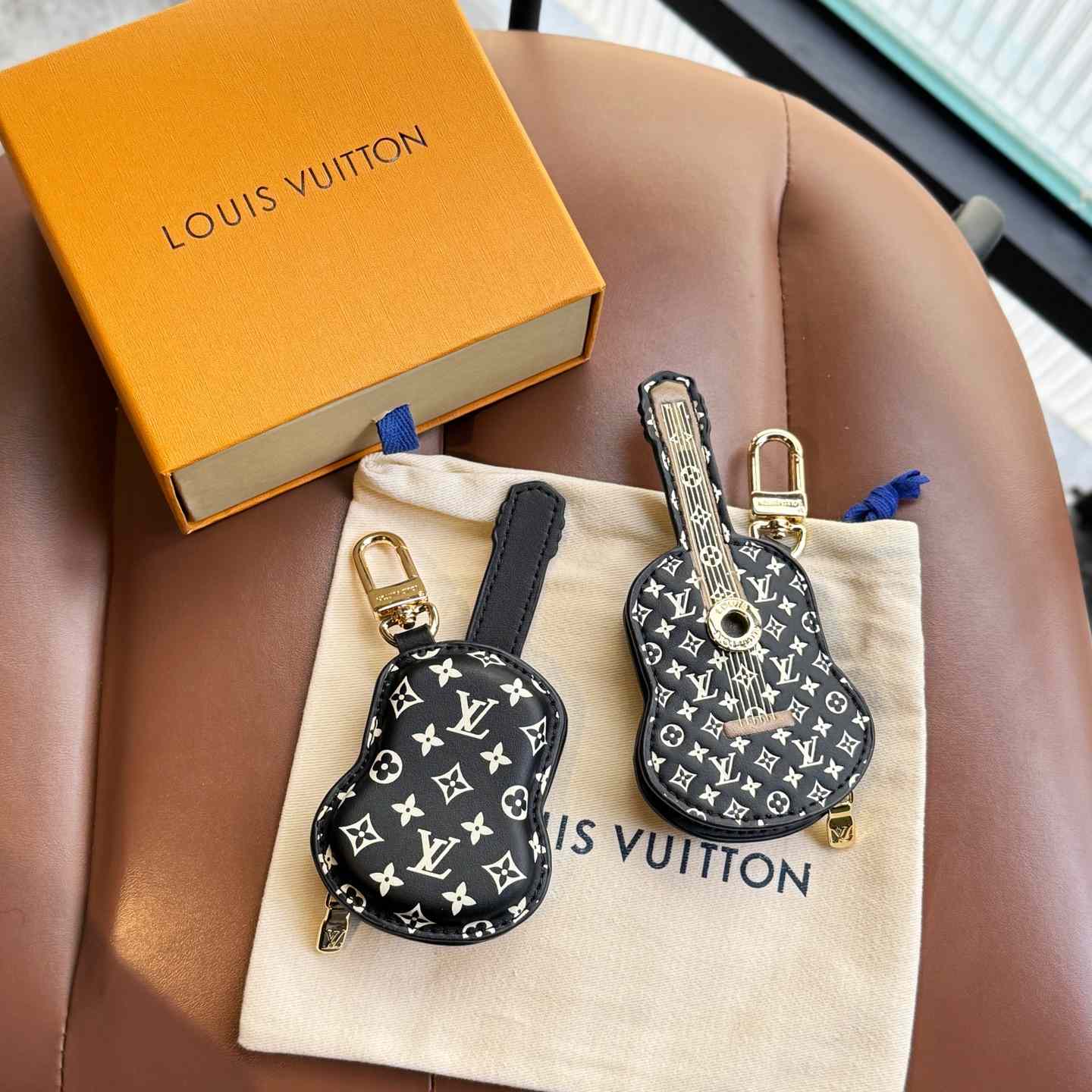 Louis Vuitton Guitar Pouch Bag Charm   M02032 - DesignerGu