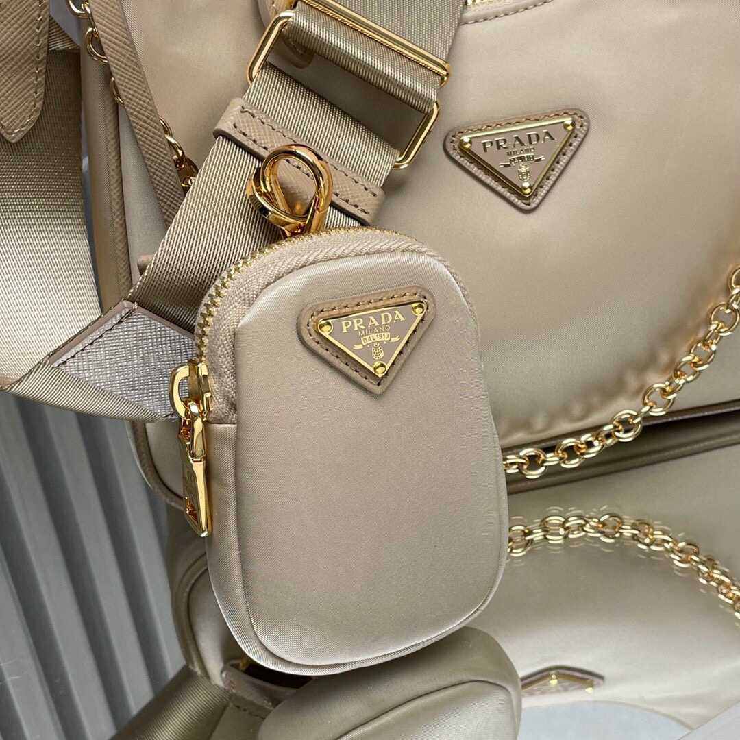 Prada Re-Edition 2005 Re-Nylon And Saffiano Leather Bag With Charm - DesignerGu