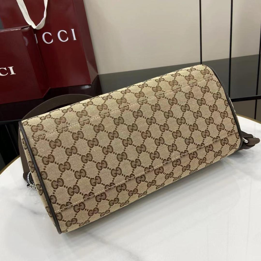 Gucci GG Canvas Small Cylinder Bag - DesignerGu