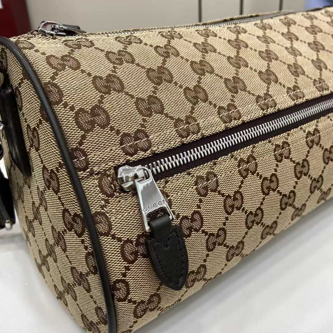 Gucci GG Canvas Small Cylinder Bag - DesignerGu