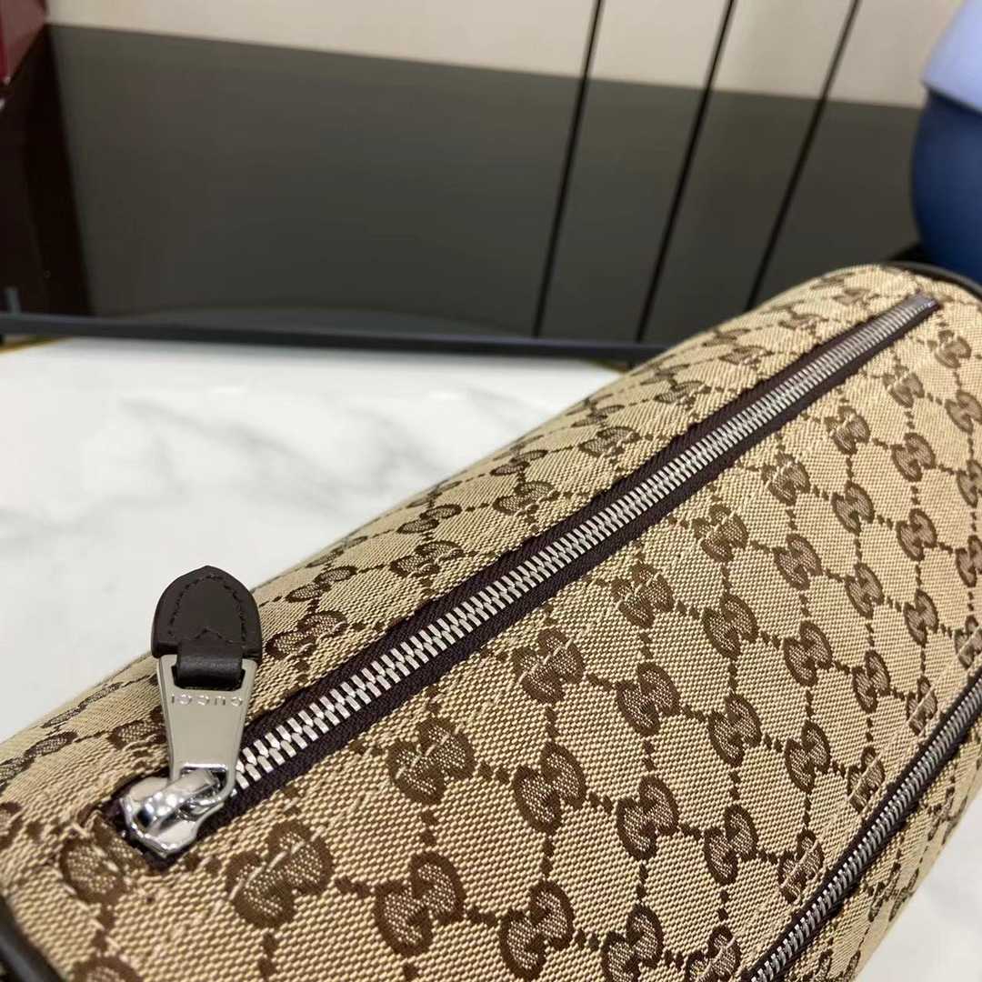 Gucci GG Canvas Small Cylinder Bag - DesignerGu