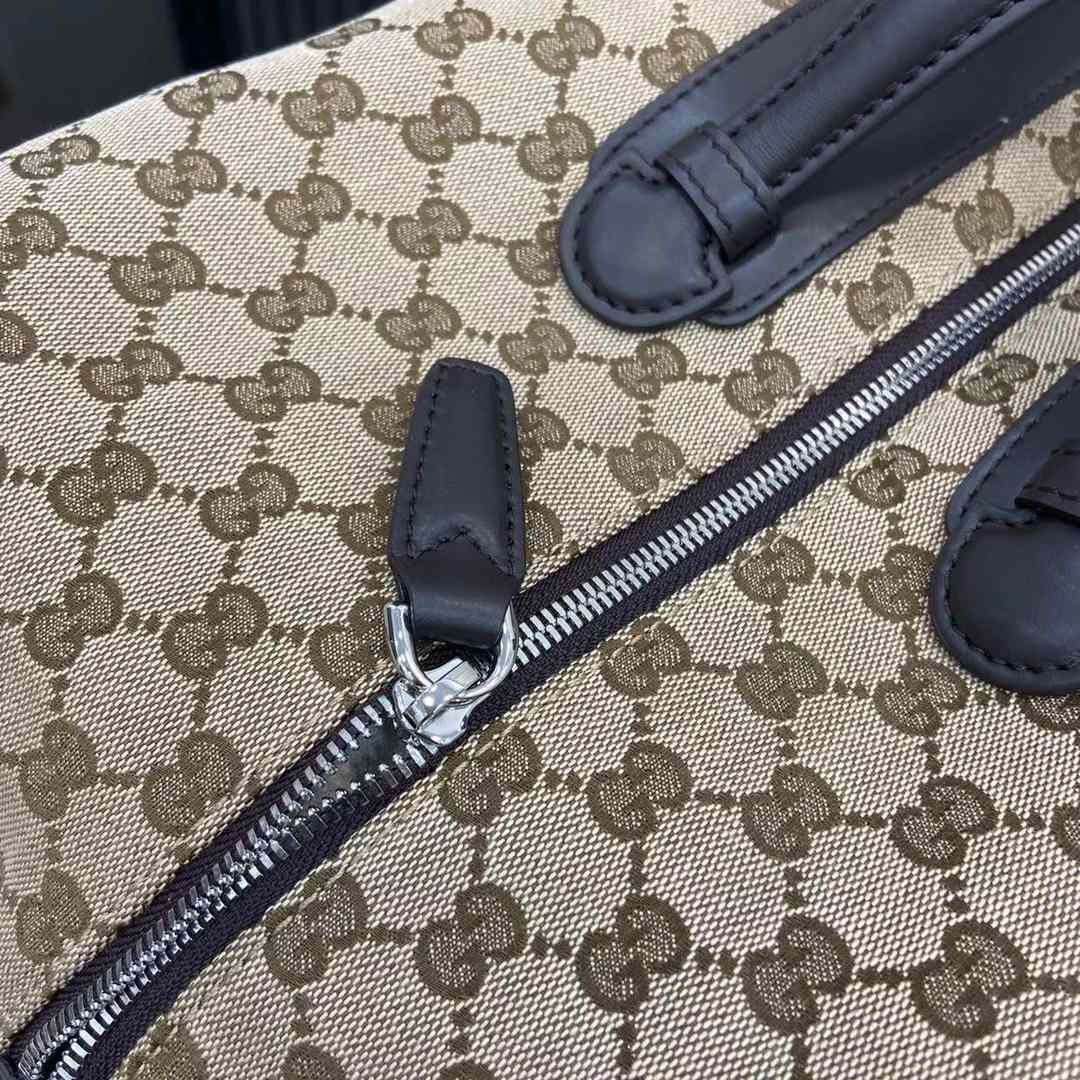Gucci GG Canvas Medium Duffle Bag - DesignerGu
