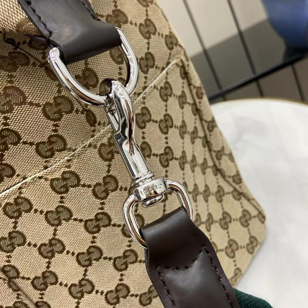Gucci GG Canvas Medium Duffle Bag - DesignerGu