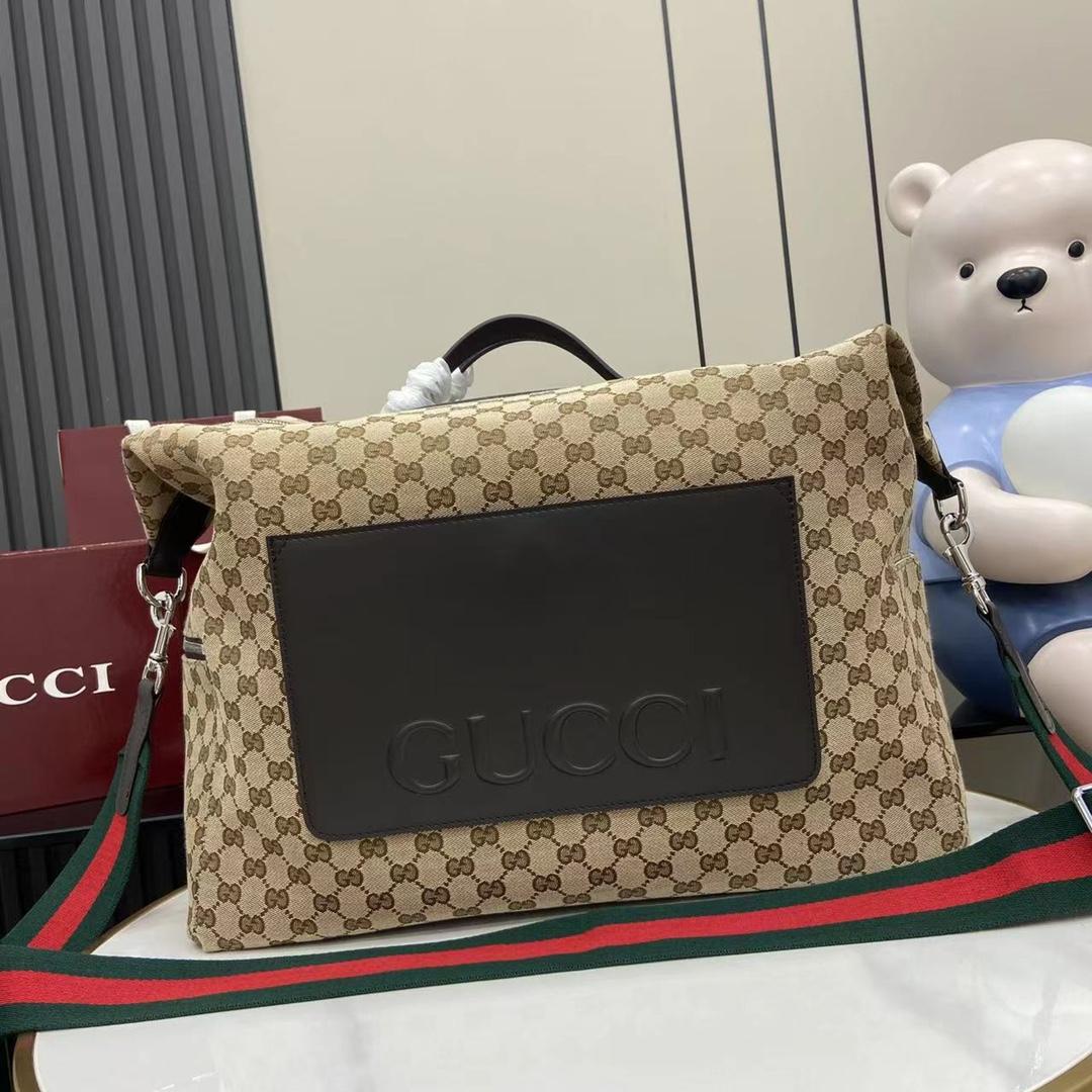 Gucci GG Canvas Medium Duffle Bag - DesignerGu