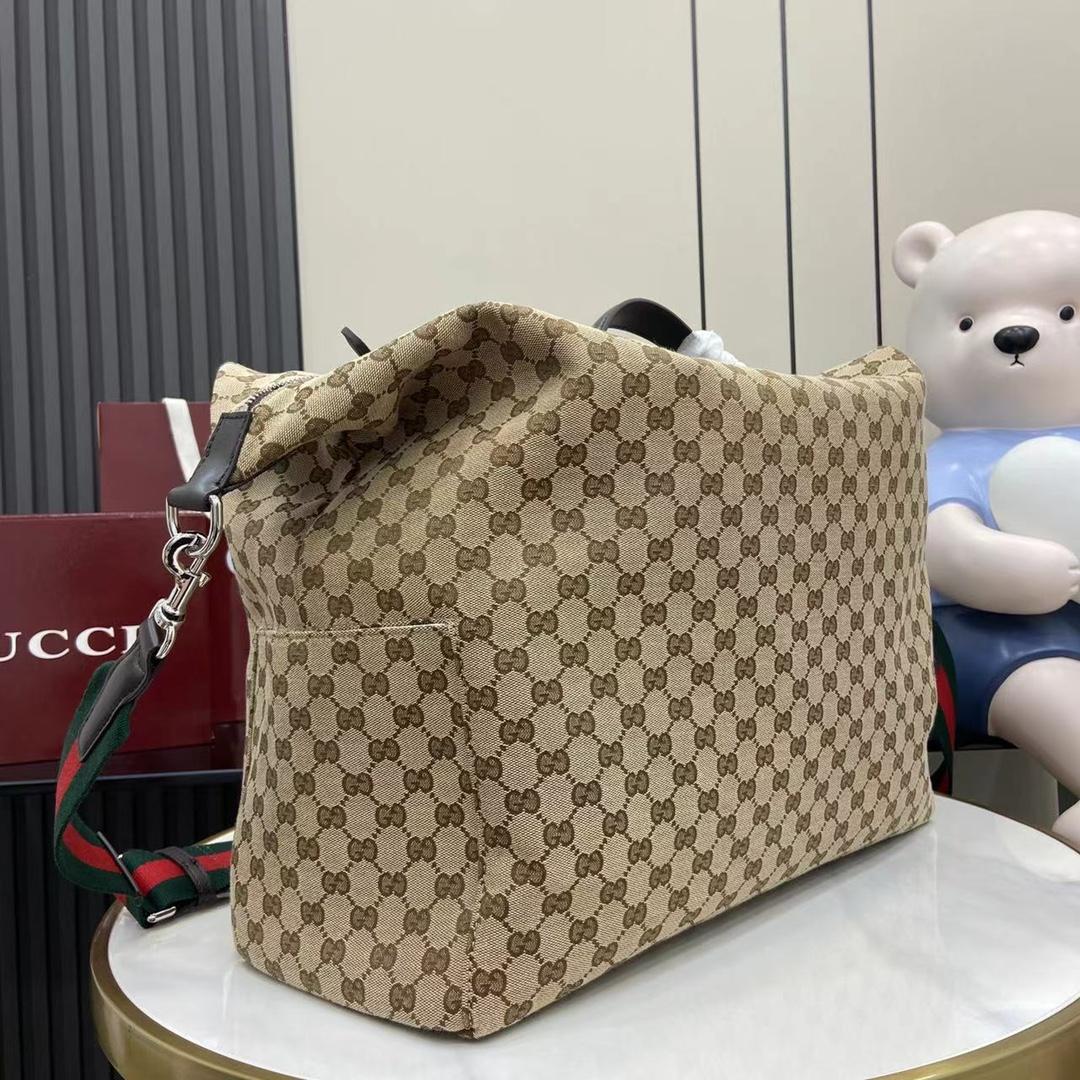 Gucci GG Canvas Medium Duffle Bag - DesignerGu