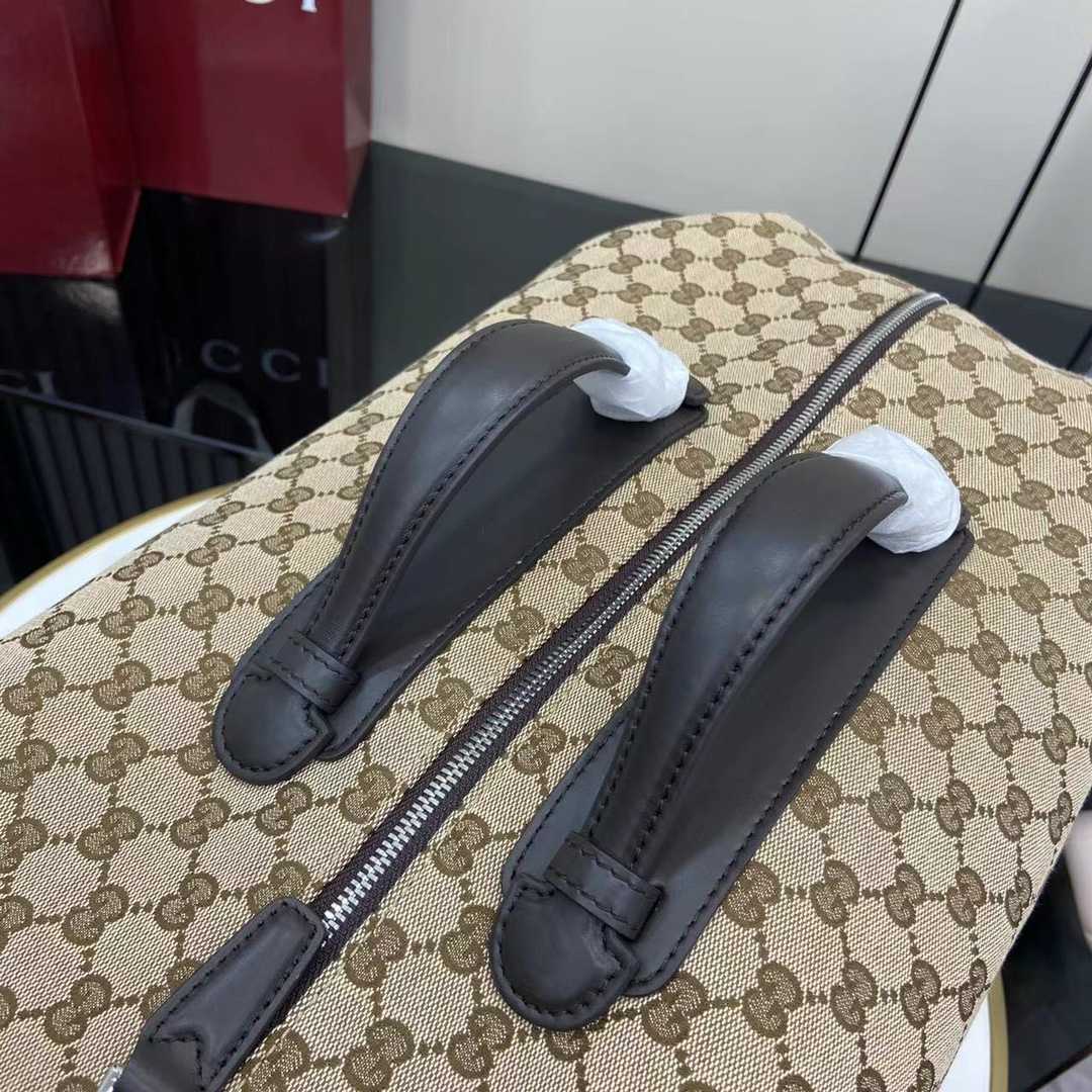 Gucci GG Canvas Medium Duffle Bag - DesignerGu