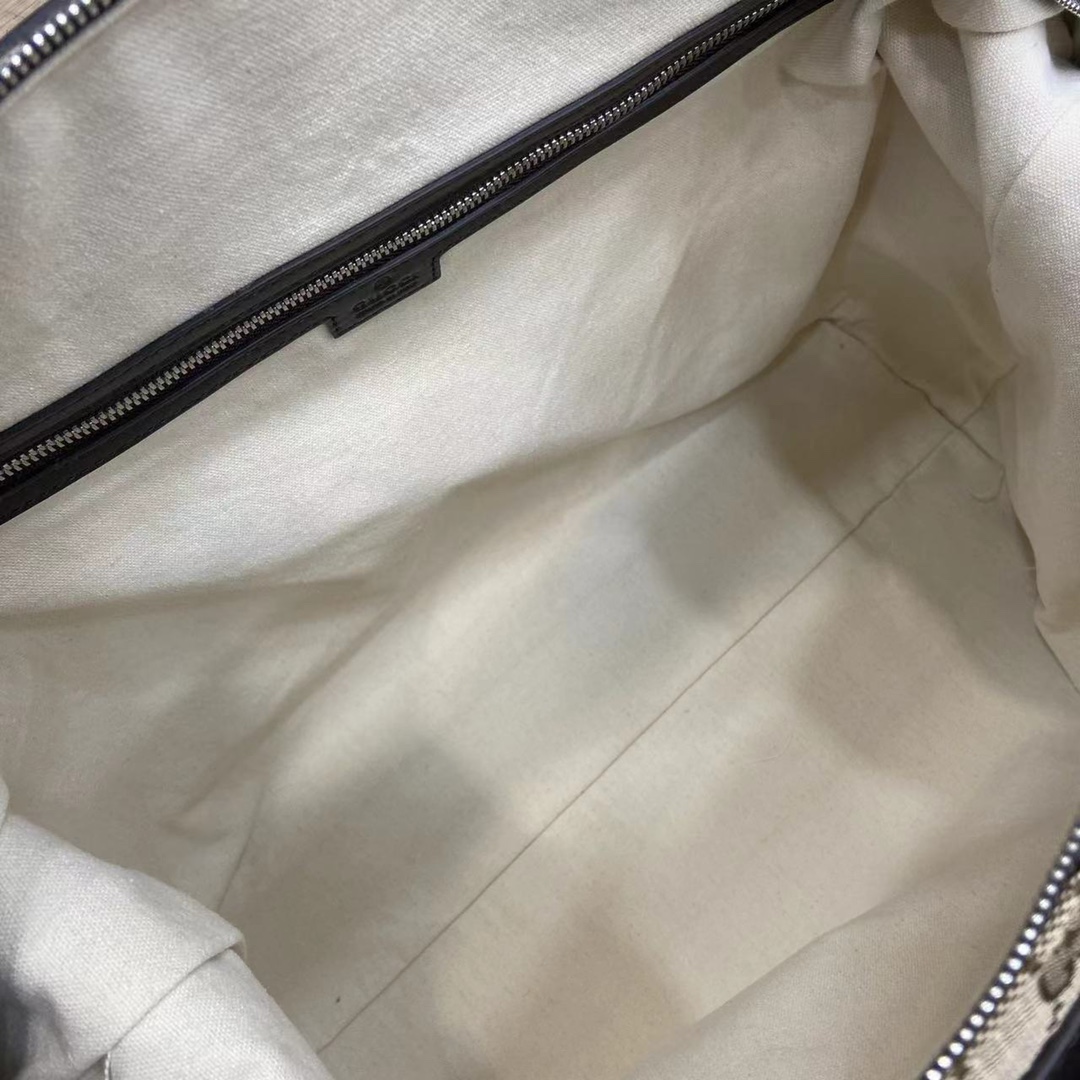 Gucci GG Canvas Medium Duffle Bag - DesignerGu