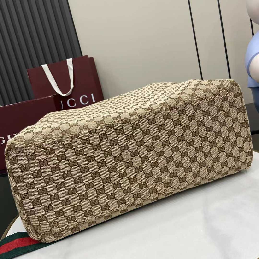 Gucci GG Canvas Medium Duffle Bag - DesignerGu