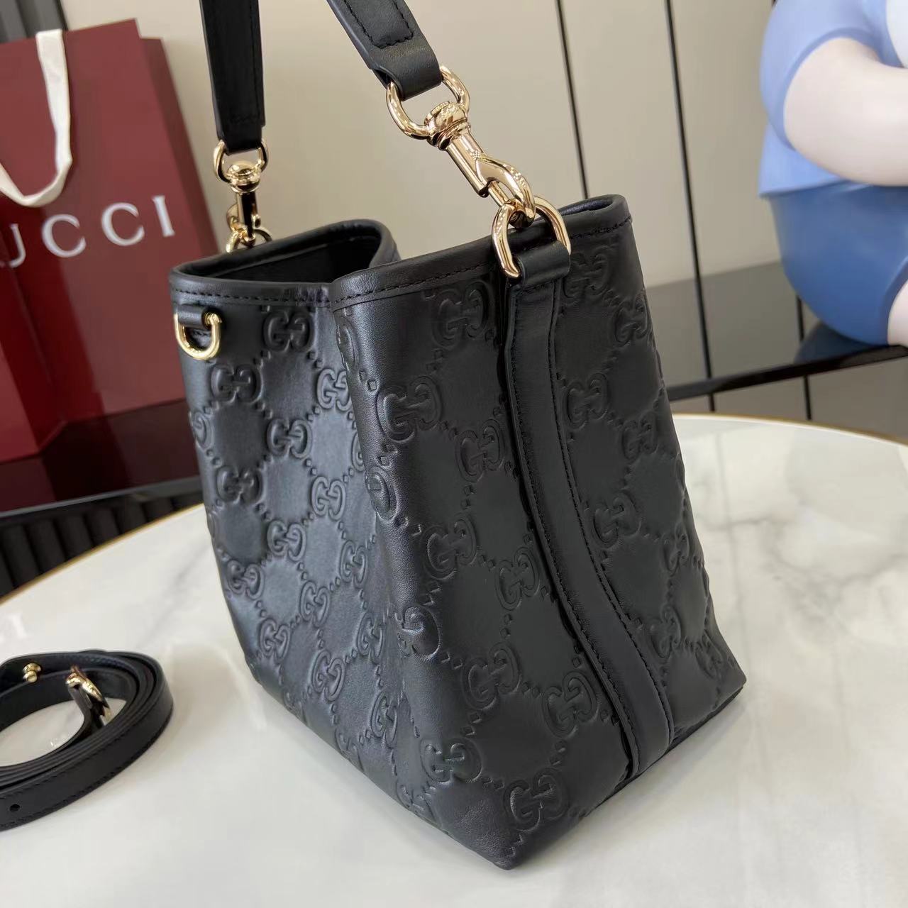 Gucci GG Emblem Small Bucket Bag  - DesignerGu