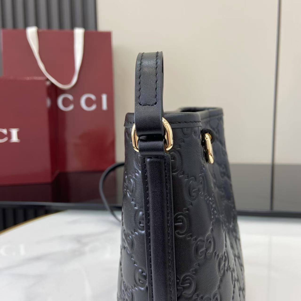 Gucci GG Emblem Nano Bucket Bag - DesignerGu