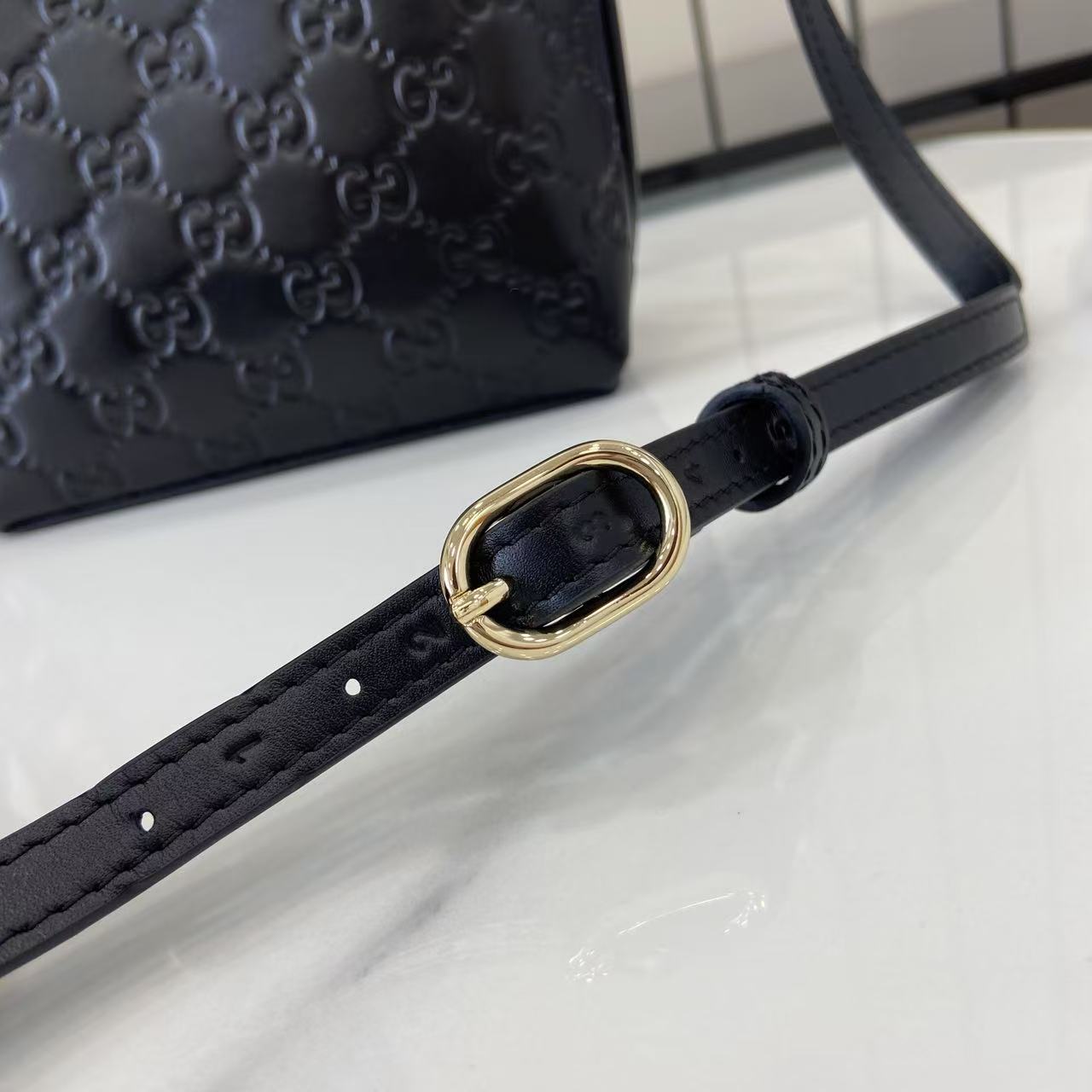 Gucci GG Emblem Nano Bucket Bag - DesignerGu