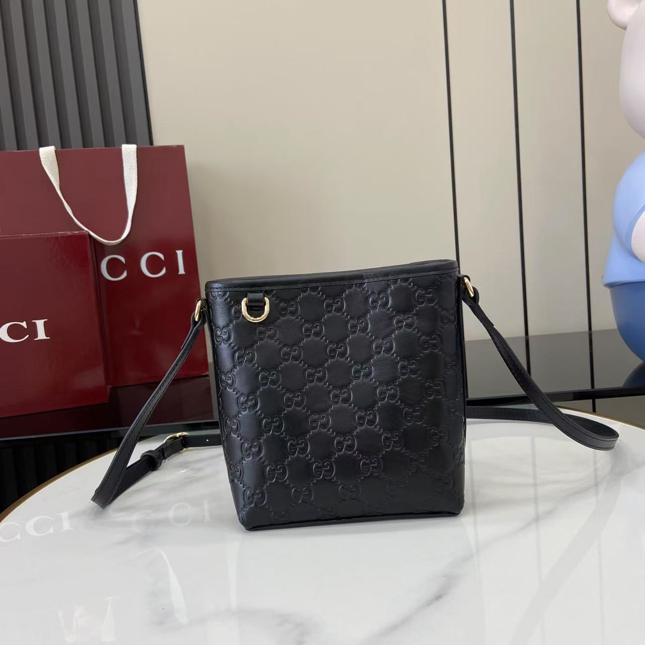 Gucci GG Emblem Nano Bucket Bag - DesignerGu
