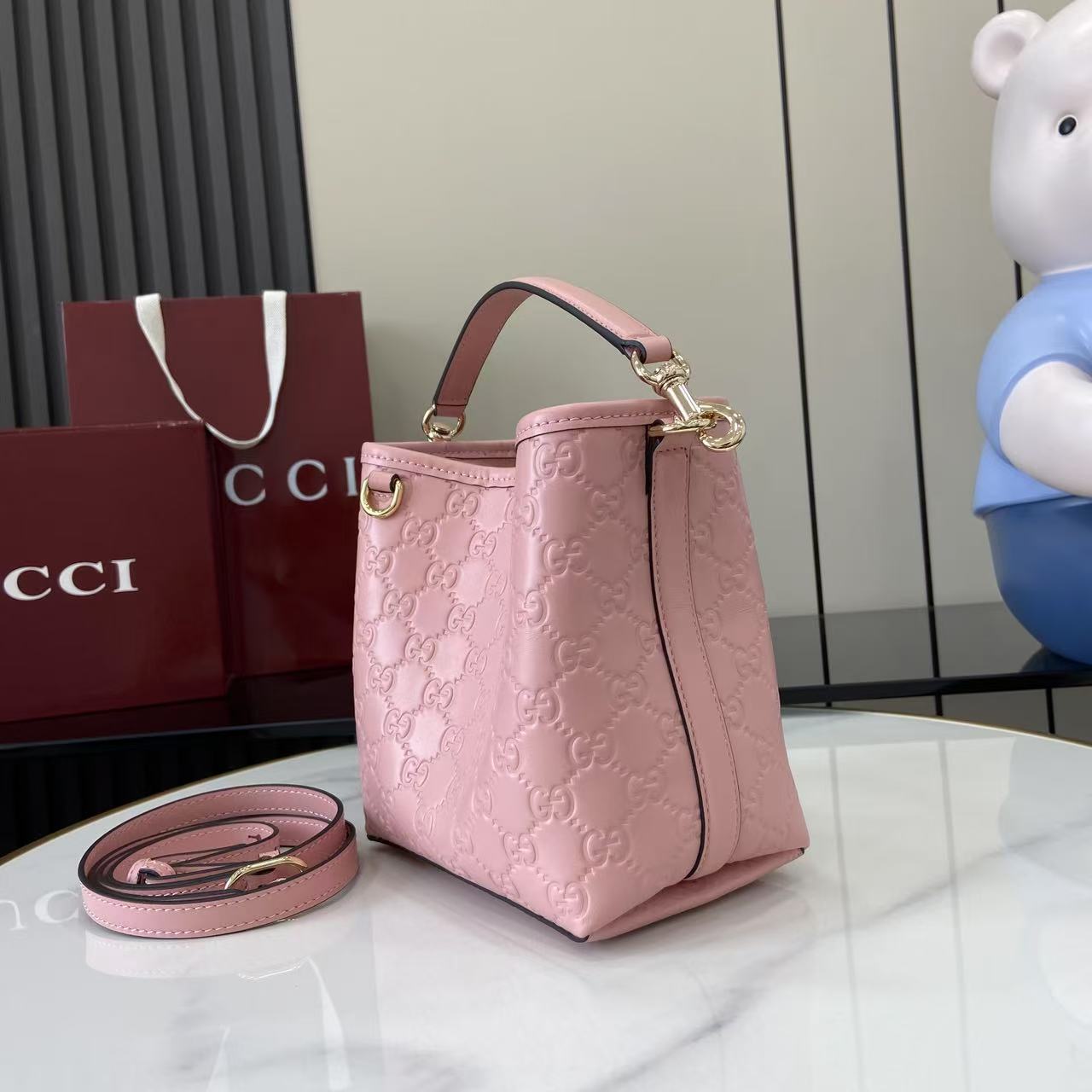 Gucci GG Emblem Nano Bucket Bag - DesignerGu