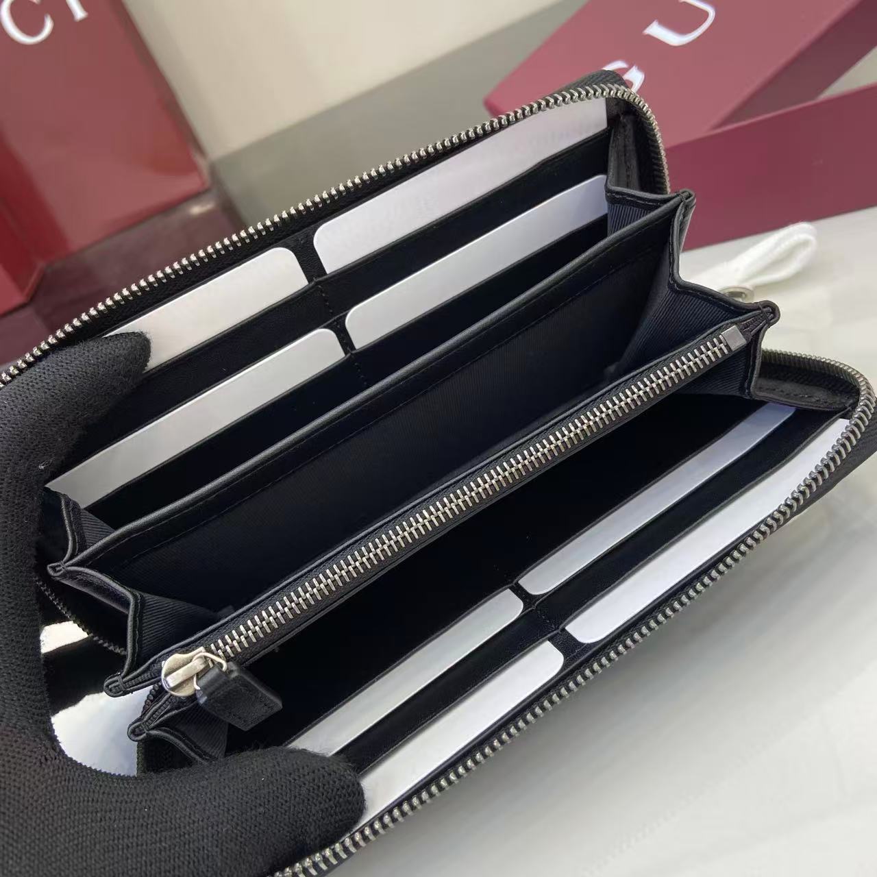 Gucci GG Emblem Zip Around Wallet - DesignerGu