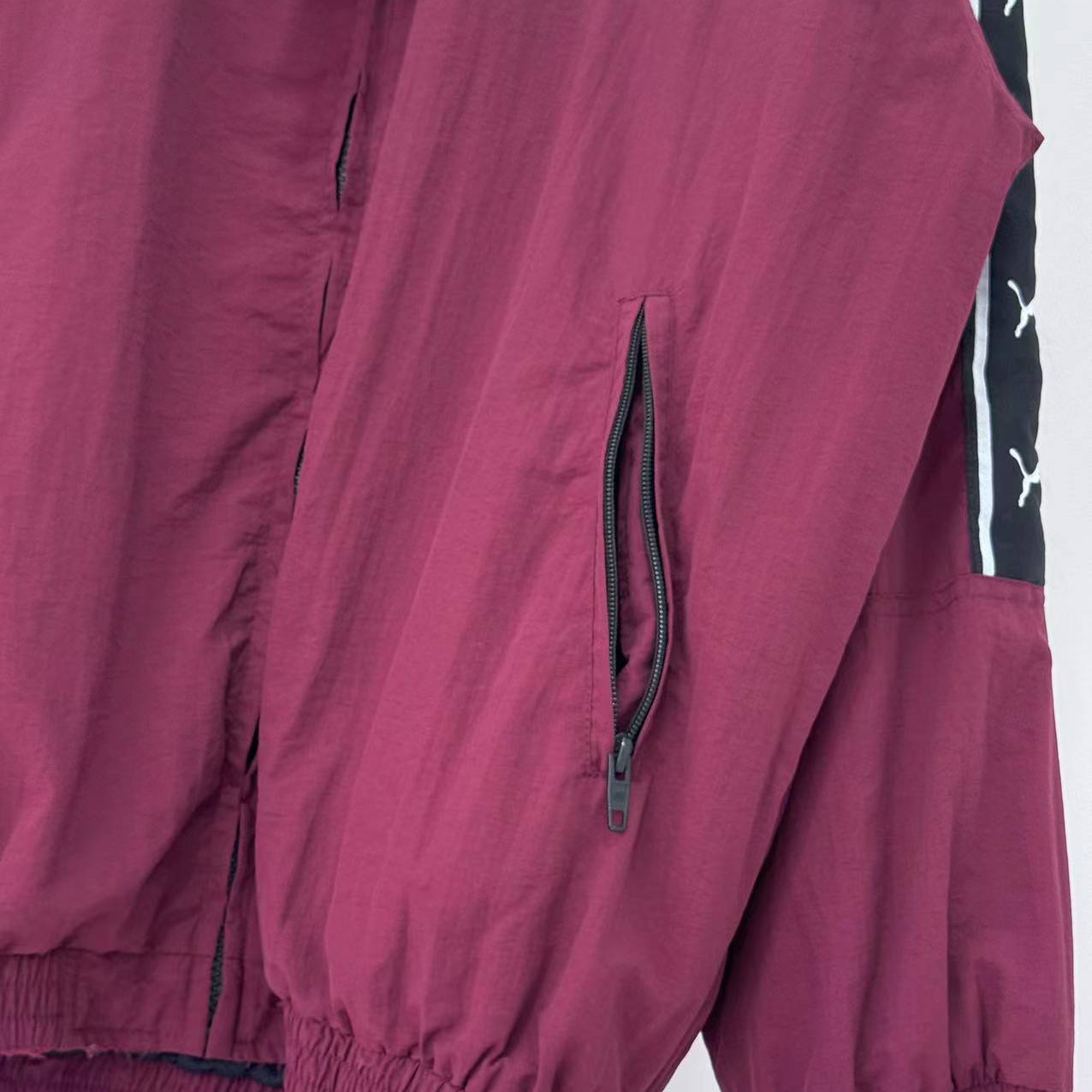 Balenciaga I PUMA Tracksuit Jacket in burgundy - DesignerGu