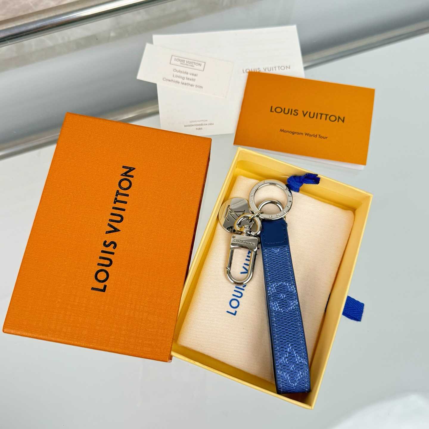 Louis Vuitton LV Slim Dragonne Key Holder and Bag Charm S00  - DesignerGu