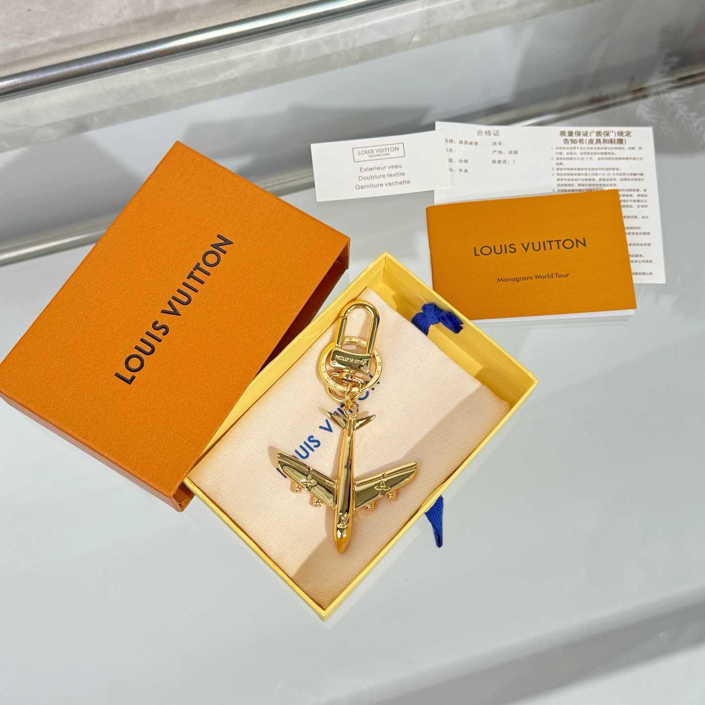 Louis Vuitton LV Plane Key Holder and Bag Charm S00 - DesignerGu