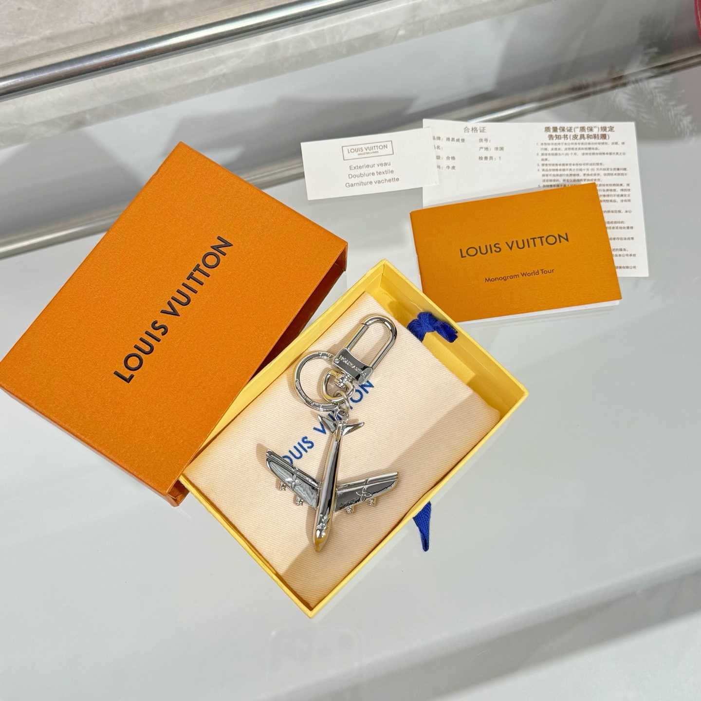 Louis Vuitton LV Plane Key Holder and Bag Charm S00 - DesignerGu