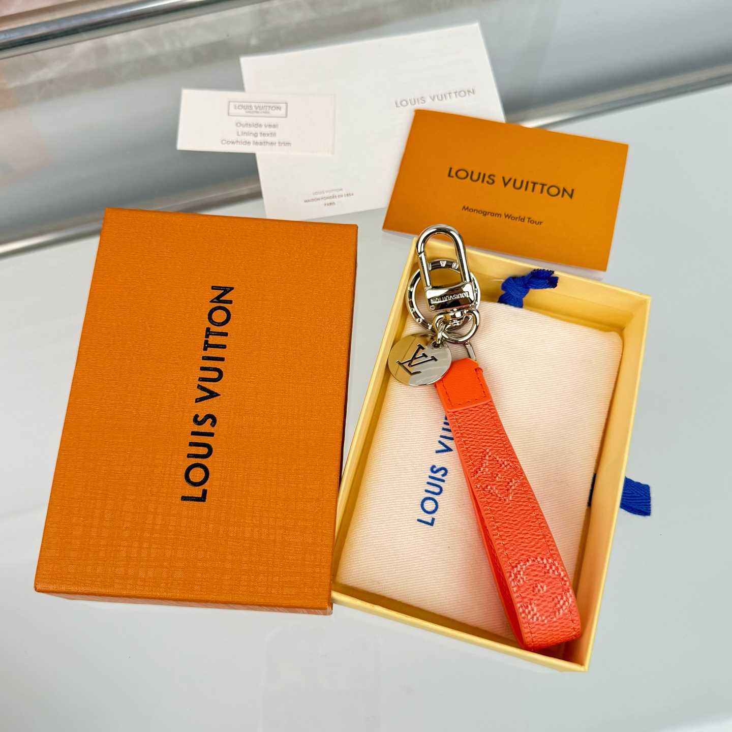 Louis Vuitton LV Slim Dragonne Key Holder and Bag Charm S00  - DesignerGu