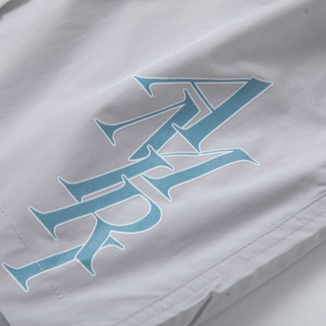 Amiri Stack Logo Swim Shorts In Stretch Limo - DesignerGu