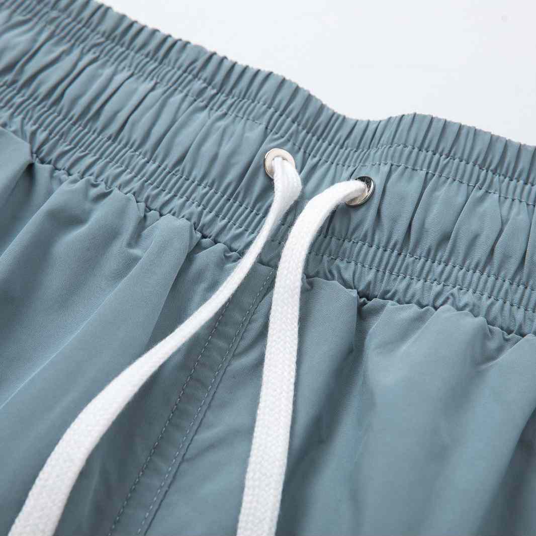 Amiri Core Logo Swim Shorts Dusty Blue - DesignerGu