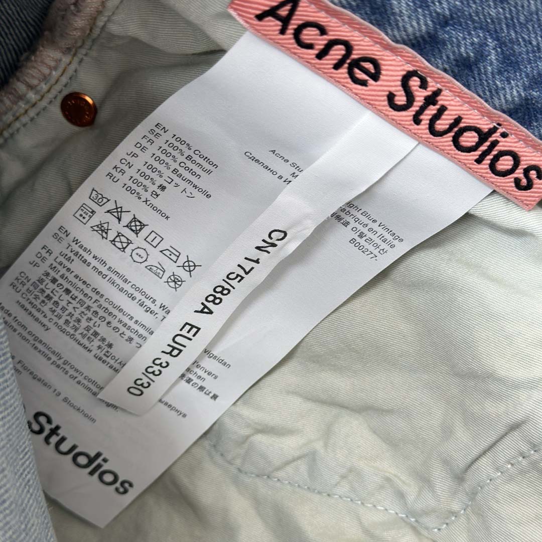 Acne Studios Mud-dyed torn jeans - DesignerGu