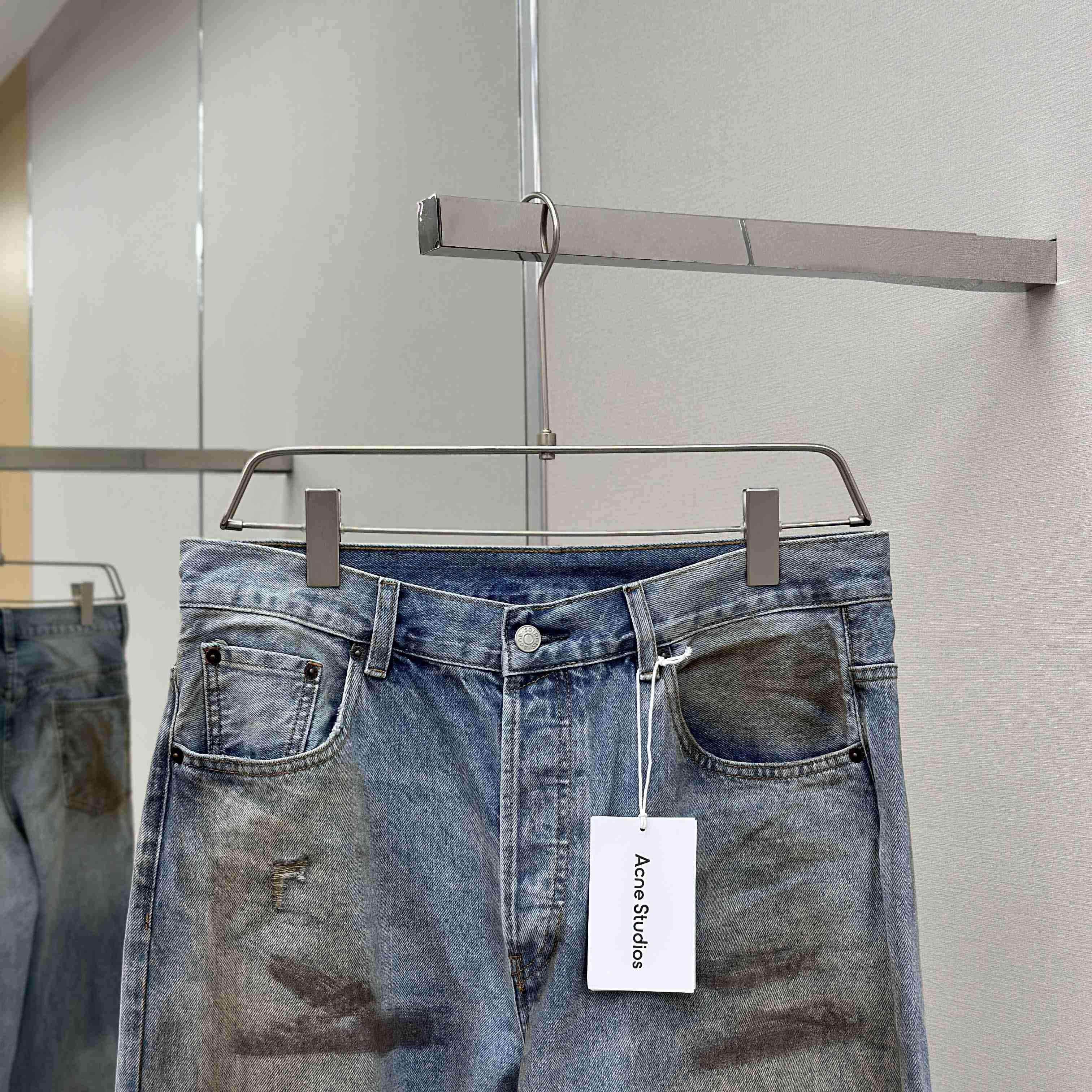 Acne Studios Mud-dyed torn jeans - DesignerGu