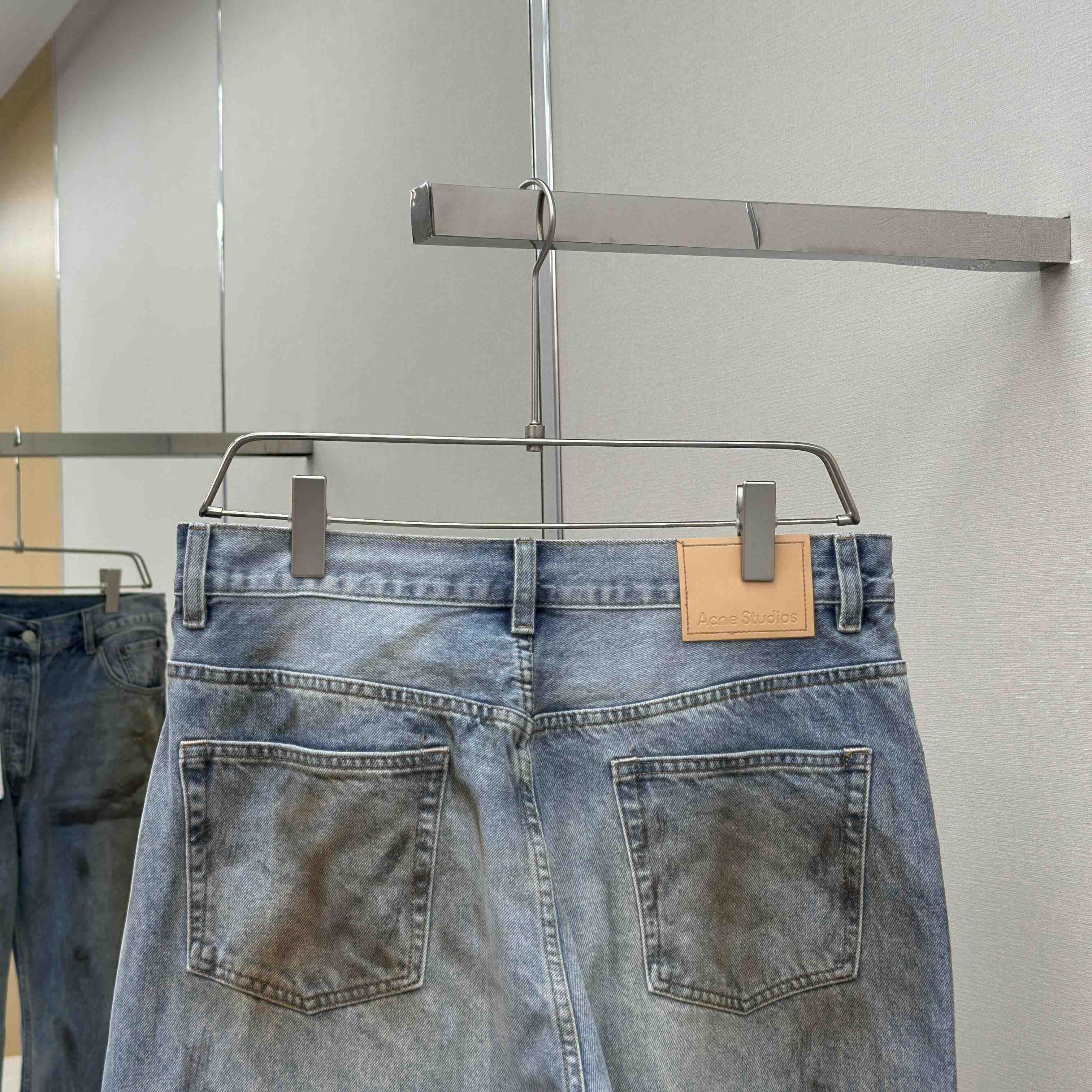 Acne Studios Mud-dyed torn jeans - DesignerGu