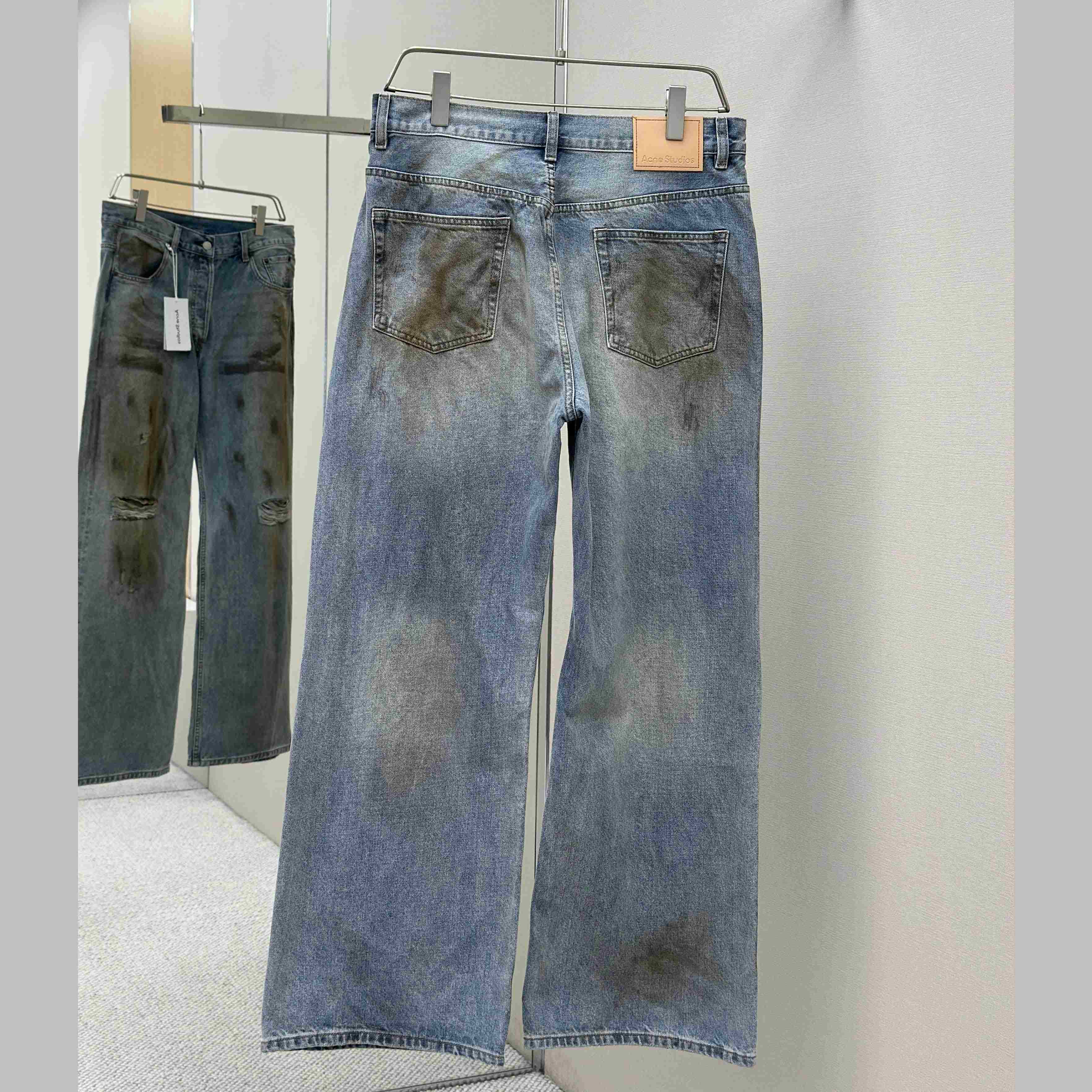 Acne Studios Mud-dyed torn jeans - DesignerGu