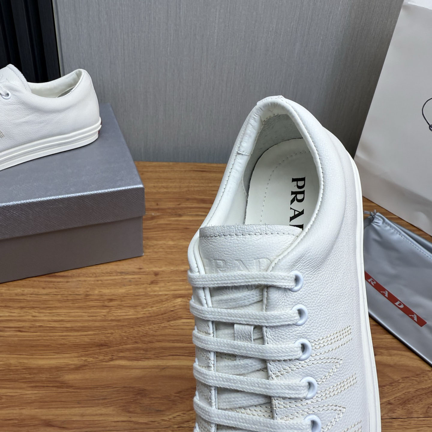 Prada Distressed Leather Sneakers - DesignerGu