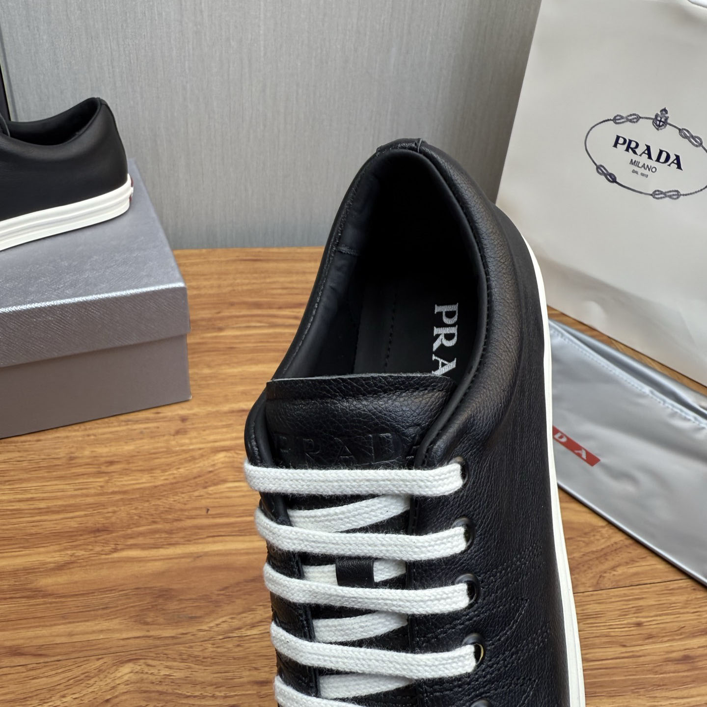 Prada Aged-Effect Lace-Up Low-Top Sneakers - DesignerGu