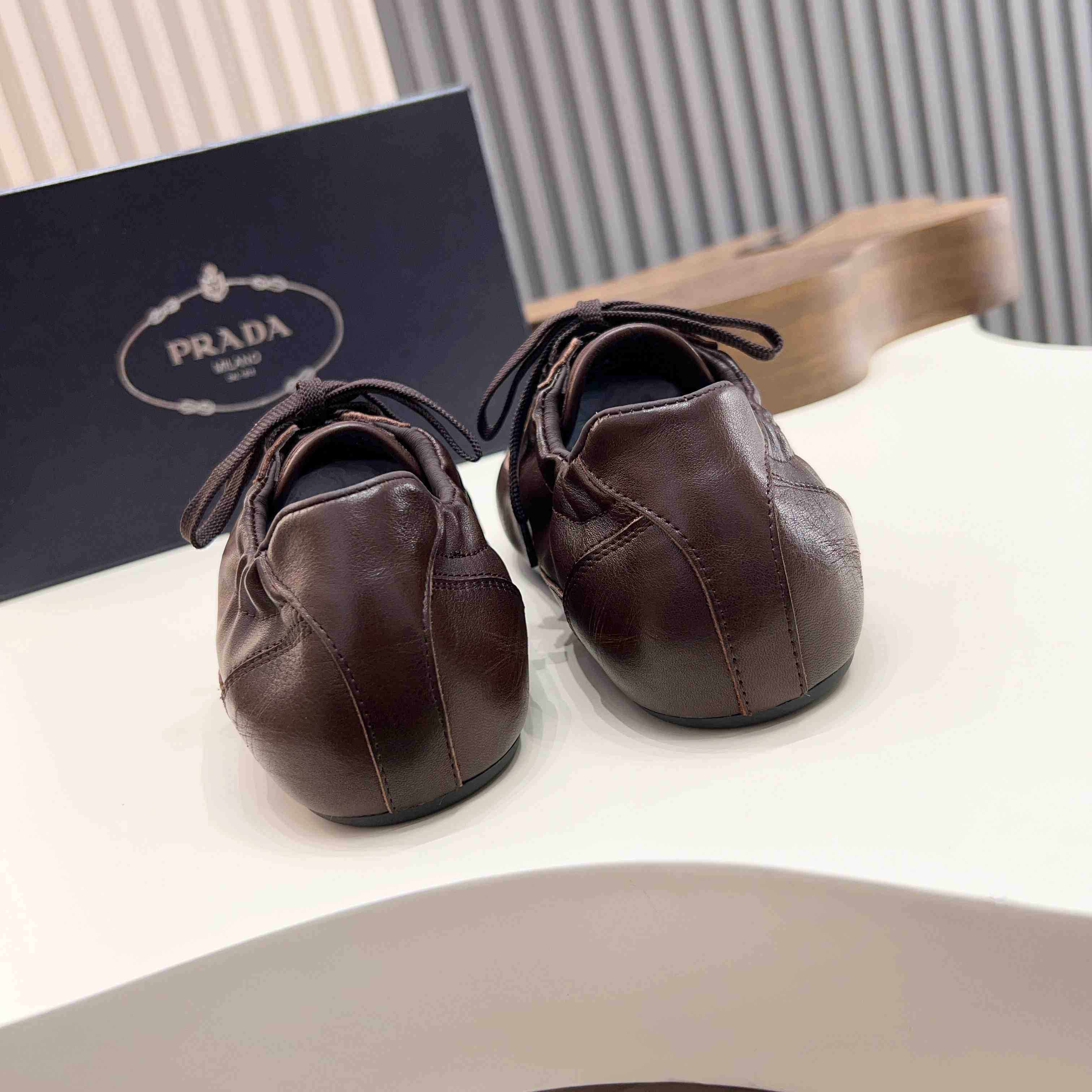 Prada Collapse Leather Sneakers - DesignerGu