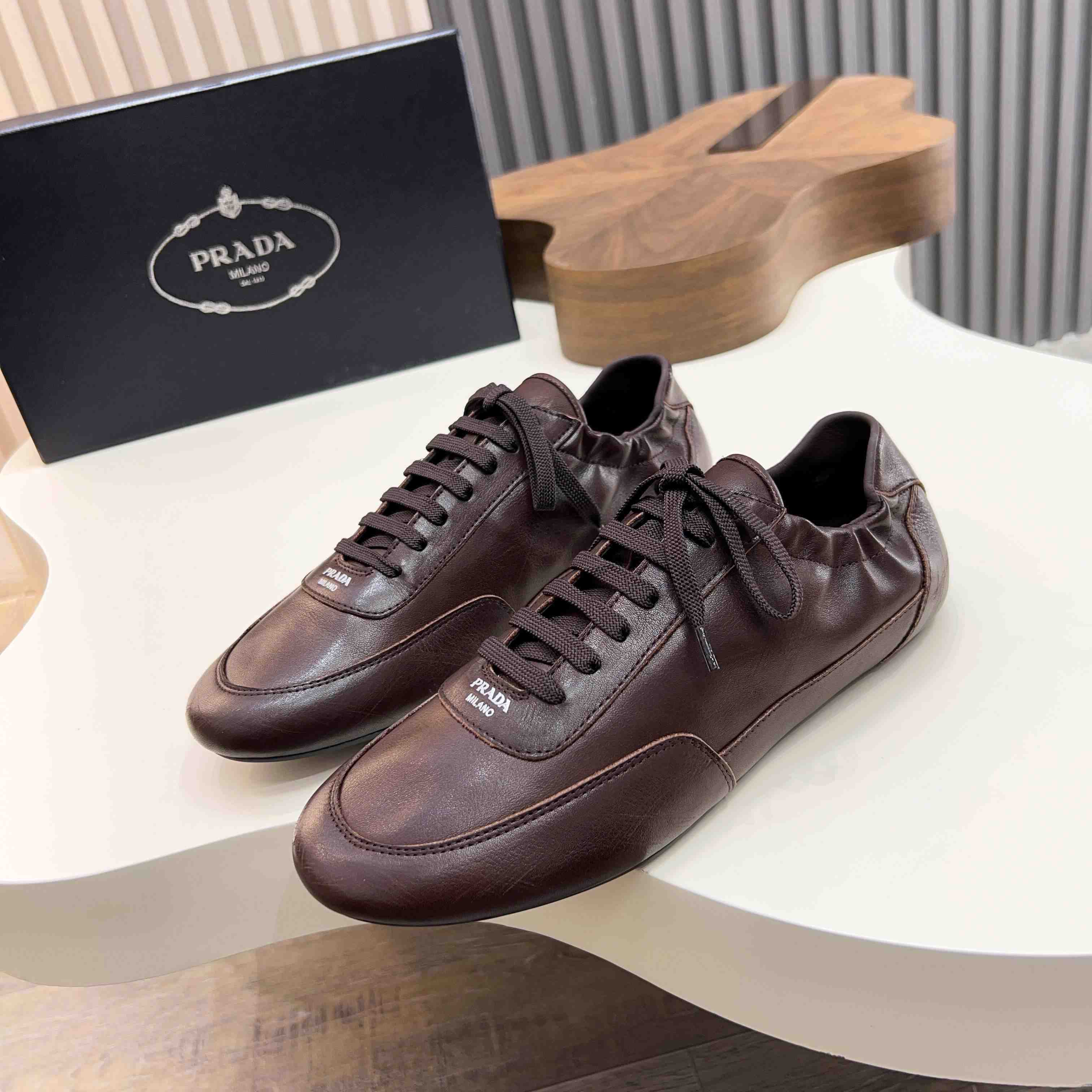 Prada Collapse Leather Sneakers - DesignerGu
