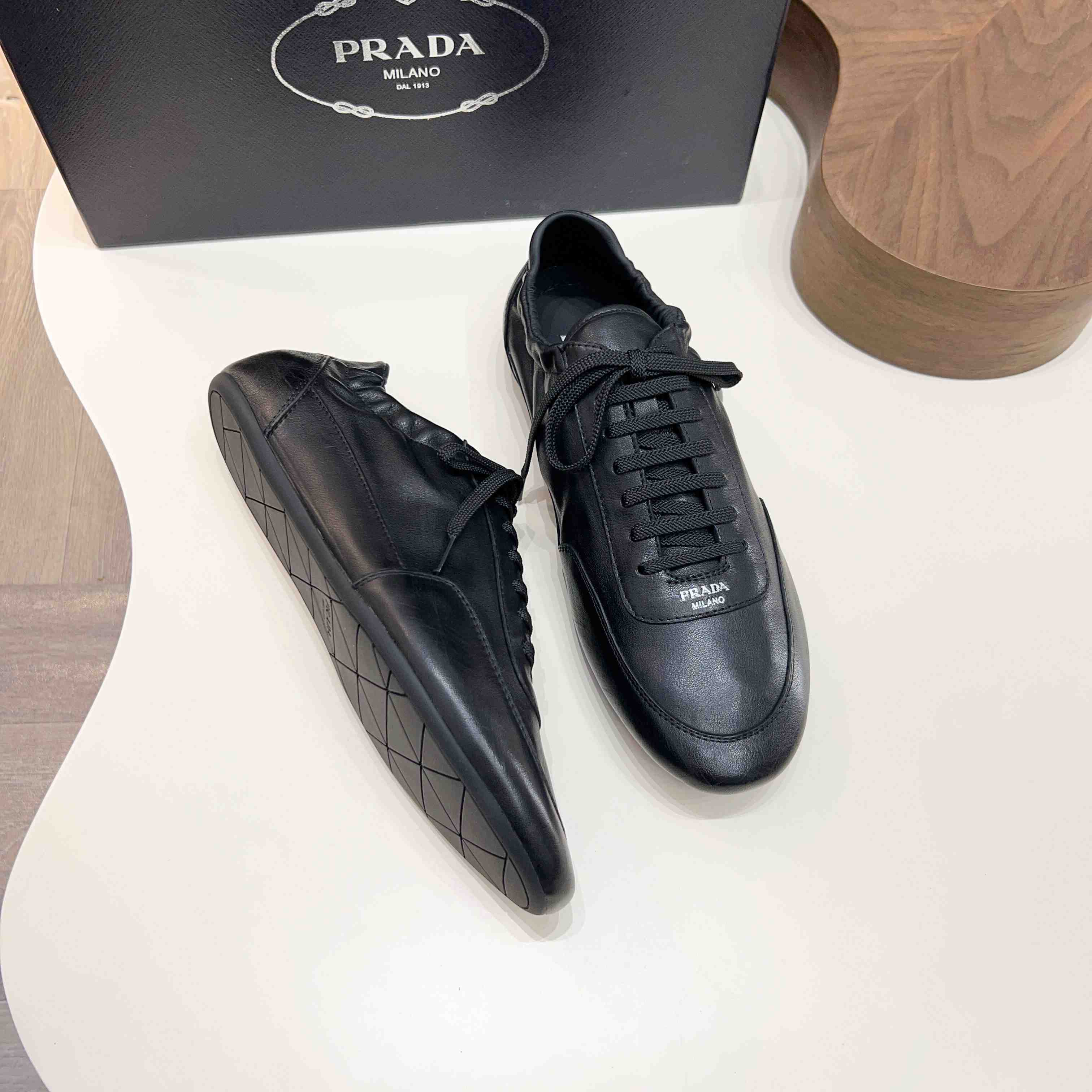 Prada Collapse Leather Sneakers - DesignerGu
