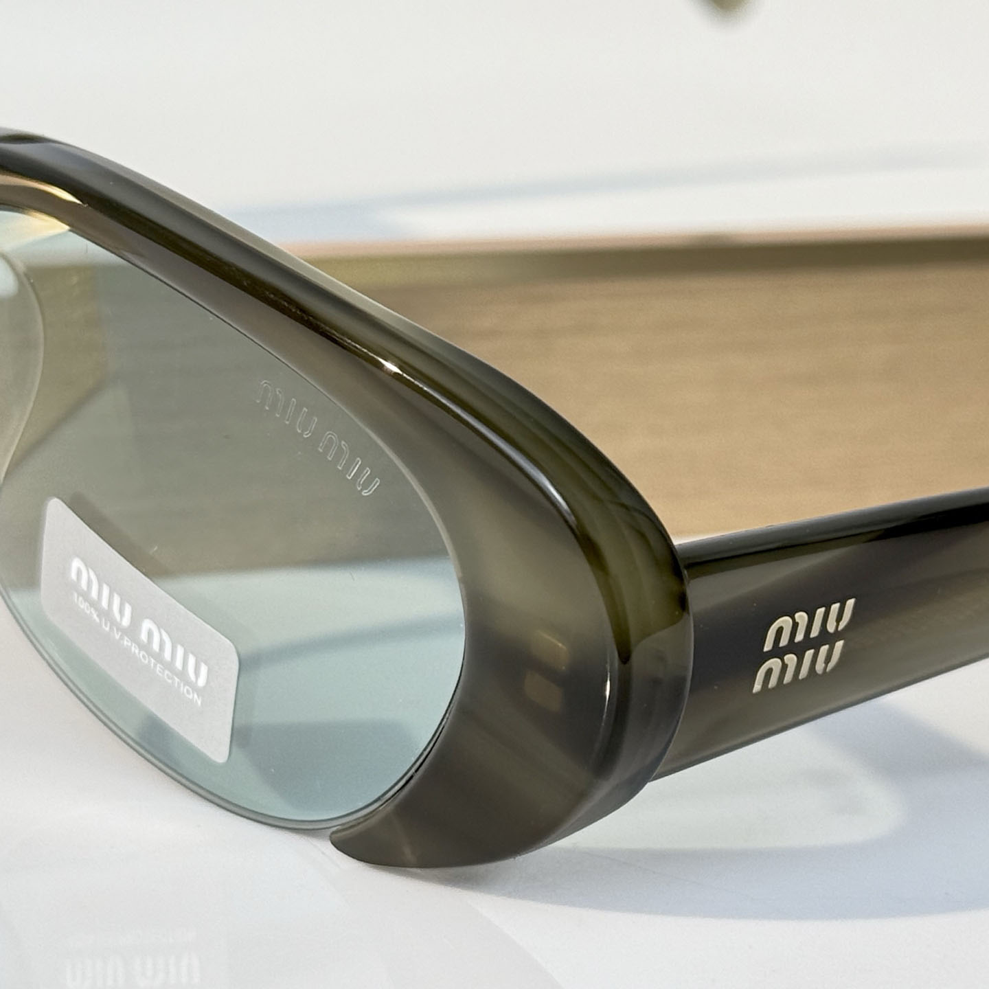 Miu Miu SMU C05-U Sunglasses - DesignerGu